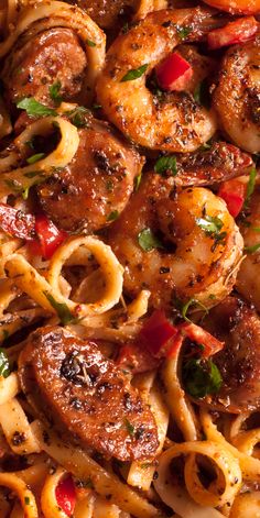 pasta with shrimp and peppers in a pan