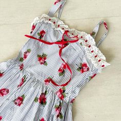 "How sweet is this!!?!! Roses on pinstripes. This late-40s early-50s number has pretty eyelet lace and a ribbon running through it. Squealllll Matching red buttons run down the back making this a truly special piece. Condition: Excellent Label: None. Well made. Bust 32\" Waist 25\" Landry 43\" This item has been professionally cleaned and is ready to wear. Comes from a smoke and pet free home. Don't forget to follow me on Instagram @tammaraclearshercloset for new listing alerts. This is shipping Vintage Americana Fashion, Vintage Americana Aesthetic, Rustic Fashion, Grecian Goddess, Peacock Dress, Dark Feminine, Americana Fashion, Vintage Wardrobe, Vintage Americana