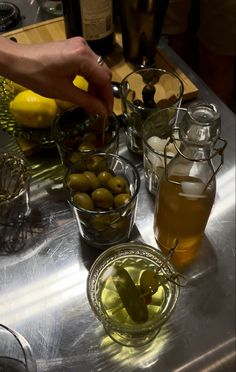 olives and lemons are being prepared on a table