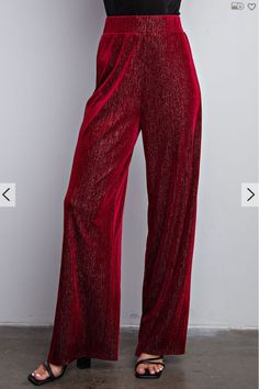 Introducing our Velvet Sparkle Festive Flares – your go-to pants for a season filled with warmth, merriment, and style. These flared pants are as versatile as they are stylish. Dress them up with a glamorous top and heels for Christmas parties that shine as brightly as you do. Or, keep it cozy and chic for Thanksgiving gatherings with a chunky sweater and ankle boots. Self: 88% Polyester, 6% Spandex, 6% Cannetille Hand Wash Cold Colors may vary with different viewing devices. Velvet Holiday Pants, Santa Flare Pants, Winter Velvet Fitted Pants, Party Velvet Wide-leg Pants, Burgandy Velvet Pants, Velevet Flare Pants, Luxury Velvet Wide-leg Pants, Pants And Leggings, Chunky Sweater