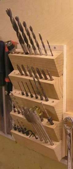 a bunch of tools that are sitting on a shelf