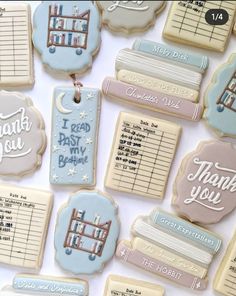 decorated cookies with thank you written on the front and back of them, all in pastel colors