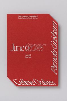 a red business card with white lettering on it