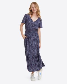 Patsy Midi Dress in Wildflower Ditsy – Draper James Casual V-neck Dress With Ruffle Hem For Summer, Casual Ruched V-neck Dress For Spring, Flowy Floral Print V-neck Dress, Summer V-neck Ruched Dress, Flowy V-neck Midi Dress For Beach, Casual V-neck Dress With Ruffle Hem For Spring, Viscose V-neck Ruched Midi Dress, Ruched V-neck Midi Dress In Viscose, Casual V-neck Dress With Flowy Skirt