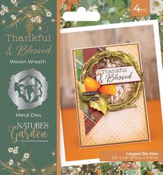 a card with an orange and green wreath on it, surrounded by other greeting cards