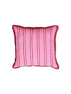 a pink and white striped pillow on a white background