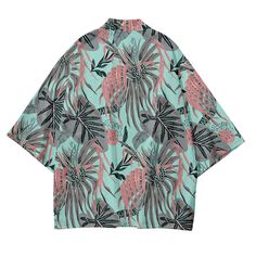 Our Tropical Kimono Shirt, a perfect blend of exotic flair and comfortable style. Embrace the vibrant energy of the tropics with this beautifully designed shirt that is sure to make a statement wherever you go. Crafted with care, our Tropical Kimono Shirt features lightweight and breathable fabric, making it ideal for warm weather and beach destinations. Its loose and flowing silhouette offers both comfort and versatility, allowing you to effortlessly transition from lounging poolside to explori Patterned Shirt For Beach In Spring, Patterned Shirt For Spring Beach Outing, Summer Hawaiian Shirt Long Sleeve Printed, Summer Long Sleeve Printed Hawaiian Shirt, Summer Beach Shirt In Patterned Design, Patterned Tops With Plant Print For Vacation, Casual Patterned Top With Plant Print, Hawaiian Printed Relaxed Fit Shirt, Green Hawaiian Shirt For Spring