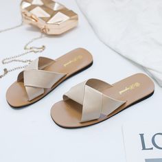 Slip into style with our Women's Cross Strap Flat Heel Sandals. These easy, breezy sandals come in 4 colours and feature a fashionable cross strap design. Perfect for any occasion, they'll have you stepping out in comfort and style. Material: PU leatherHeel height: flat heelStyle: Women’s flat heel slip on sandals See all sandals and flip-flops here. ***Please use foot length to choose size. Cross Belt, Trendy Heels, Footwear For Women, Trendy Sandals, Comfortable Slippers, Belt Design, Pu Heels, Beach Sandals, Cross Straps