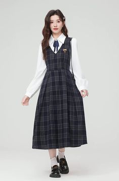 Two piece set featuring a basic plain white blouse with removable neck pin to layer with a plaid v-neck pinafore with a tie-waist and pleated midi skirt. Opens easily with a concelaed back zipper. S: 36" chest, 25" waist, 44" lengthM: 37.5" chest, 26.5" waist, 44" lengthL: 39" chest, 28" waist, 44" length Plain White Blouse, Church Fashion, Pleated Midi Skirt, Overall Dress, Plain White, Sweater Blouse, White Blouse, Two Piece Set, Cardigan Jacket