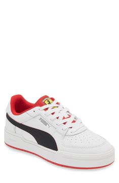 This straight-from-the-archives sneaker is redesigned with Ferrari racing colors and streamlined PUMA Formstrips at the sides for signature style. Lace-up style Leather and synthetic upper/textile lining/rubber sole Imported PUMA has received the Fair Labor Association accreditation, which signifies that the company has effective systems and procedures in place to successfully uphold fair labor standards throughout its supply chains, including strategies and tools to address and improve working High-top Puma Sneakers For Jogging, Sporty Puma Sneakers For Streetwear, Puma Logo Mid-top Sneakers For Streetwear, White Puma Basketball Shoes For Streetwear, Puma Logo Lace-up Sneakers For Streetwear, Sporty Low-top Basketball Shoes With Puma Logo, Puma Lace-up Sneakers For Streetwear, Sporty Low-top Puma Basketball Shoes, Puma High-top Sneakers For Streetwear