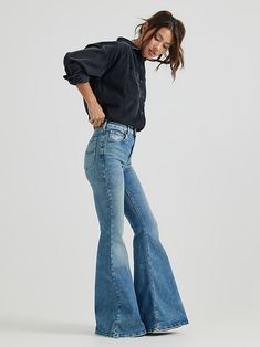 (Previously known as Vintage Modern High Rise Ever Fit Flare Jean)Made with an elastic material designed not to wear out in the wash or on the go, these high-rise darlings are built to move with you rather than against you from the moment you pull them on. Always the right fit with incredible stretch that holds and shapes your body. Our light and super comfortable Ever Fit jeans are made using pioneering technology that adapts to fit your shape or size (even if it changes). With their wide belled bottoms, these jeans are perfect for adding a dollop of disco to your look. Sized from XXS to XL, you can pair it with a graphic tee for a casually cute wardrobe staple. 70s Minimalist Fashion, High Waist Flare Jeans Outfit, Vest Outfits For Women Summer, Flare Jeans Outfit Spring, Fit And Flare Jeans, Modern Boho Clothing, Flair Jeans Outfit, High Waisted Bell Bottom Jeans, Bell Bottom Jeans Outfit