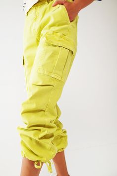 Introducing our Cargo Pants with Tassel Ends in Lime, a stylish and comfortable choice for a casual yet fashionable look. These ankle-length pants are designed to provide a relaxed and effortless fit. With a relaxed fit and straight leg, these cargo pants offer a laid-back style that is perfect for everyday wear. The comfortable fit allows for easy movement, while the straight leg design adds a touch of versatility. Crafted from stretch denim, these pants provide a comfortable and flexible feel. Stretch Denim Fabric, Effortless Outfit, Denim Pocket, Pants Fit, Casual Belt, Perfect Wardrobe, Estilo Casual, Fast Fashion, Denim Fabric