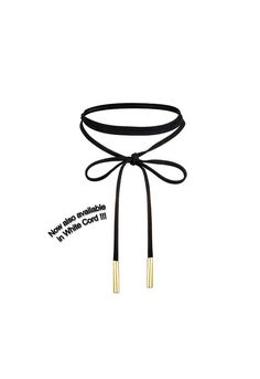 "This cute black bow choker adds an elegant touch to your outfit. Now also available in white cord. The golden or silver embellishments at the end will give you a refined and shiny touch. It can make your look more beautiful and personality. You are going to fall in love with this beautiful choker! The total length of this choker is 63.38\" / 161 cm. You control the length of the bow to adjust it to your preference. The choker comes with black suede drawstring bag to give to others as a gift. Ev Adjustable Trendy Choker For Formal Occasions, Trendy Adjustable Choker For Formal Occasions, Adjustable Black Ribbon Necklace, Black Adjustable Choker For Party, Chic Black Jewelry With Bow, Formal Adjustable Black Ribbon Choker, Black Ribbon Choker Jewelry, Elegant Black Choker With Adjustable Length, Black Ribbon Choker Necklace