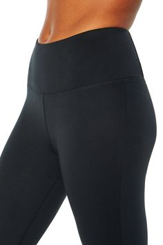 Striking a pose in and out of the studio. High Stretch Mid-rise Black Bottoms, Black High Stretch Mid-rise Bottoms, High Stretch Black Pants, Black Tight Yoga Pants, Tight Black Yoga Pants, Black High Stretch Athleisure Bottoms, Black Mid-rise Yoga Bottoms, Black Full-length Athleisure Bottoms, Versatile Tight Black Pants