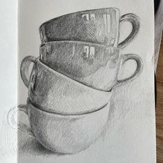 a drawing of three cups stacked on top of each other