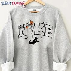 Halloween Embroidery Designs Nike, Fall Nike Sweatshirt, Halloween Shirt Cricut Ideas, Aesthetic Halloween Sweatshirts, Halloween Nike Crewneck, Matching Halloween Sweatshirts, Halloween Crewneck Cricut, Cute Halloween Crewneck, Halloween Nike Sweatshirts