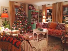 a living room filled with furniture and a christmas tree