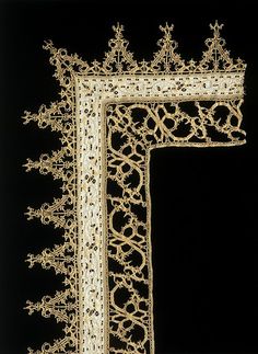 an intricately decorated frame on a black background