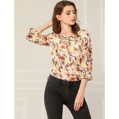 The elegant floral pattern adds dramatic styling to the semi-sheer 3/4 sleeve blouse. Full of romantic charm, this lightweight blouse is accented with a ruffle sleeve and a tie v-neck. An elegant tie-neck and half sleeves with elastic cuffs enhance the casual softy grace of the floral blouse in a loose H silhouette. Wear it with open-toe sandals and casual pants for an effortlessly feminine look. Women's Workwear Fashion, Coachella Fashion, Casual Work Outfit, Casual Date, Spring Outfits Women, Fabric Floral, Fashion Spring, Boho Casual, Casual Summer Outfit