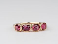 ♥ Bright Pink Red Spinel Milgrain Bezel Set Wedding Band 14K Gold ♥ The design measures 4.9mm in length (North South direction), 19.4mm in width (East West direction), and sits 4.1mm tall from the finger. Band width is 1.9mm. ♥ Ring size: US 7 (Free resizing up or down 1 size) ♥ Material: 14K Gold ♥ Gemstone: Earth-mined spinel 1.71ct ♥ We have two rings available:A - 1.71ct 14k yellow gold 7B - 1.71ct 14k rose gold 7 Bezel Set Wedding Band, 9mm Ring, Finger Band, Red Spinel, North South, East West, Bezel Setting, Bright Pink, Pink Red