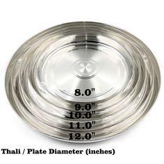 an empty metal bowl with measurements on it