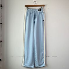 Nwt Size Small , Sky Blue Trackpant Wide Leg , Side Zipper At Bottom Of Each Leg Light Blue Cotton Sporty Pants, Light Blue Sporty Cotton Pants, Light Blue Sporty Loungewear Pants, Sporty Light Blue Cotton Pants, Sporty Light Blue Loungewear Pants, Sporty Light Blue Pants For Loungewear, Spring High-waisted Blue Sweatpants, Brown Sweatpants, Chino Joggers