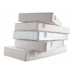 three mattresses stacked on top of each other