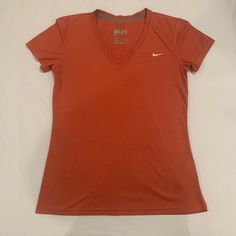 Nike Womens Shirt Athletic DRI-FIT Short Sleeve Orange Regular Fit V-Neck Size S. Great condition and fast shipping!! Nike Casual V-neck Top, Womens Shirt, Nike Womens, Workout Shorts, Dri Fit, Nike Women, Womens Shirts, V Neck, Nike