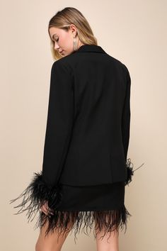 Arrive with a look that will always get you to the top of the VIP list in the Lulus Upscale Vision Black Feather Blazer! Sleek woven fabric shapes this sensational blazer with a shawl-collared neckline framed by long sleeves with lightly padded shoulders and flirty feather-trimmed cuffs. The boxy bodice features a functional, embossed gold button and two functional flap pockets. Pair with the matching skirt for a complete look! Fit: This garment fits true to size. Length: Size medium measures 25 Elegant Fitted Blazer With Feather Trim, Black Formal Outerwear With Feather Trim, Formal Black Outerwear With Feather Trim, Elegant Party Blazer With Feather Trim, Formal Fall Blazer With Feather Trim, Elegant Evening Blazer With Feather Trim, Fall Party Blazer With Feather Trim, Elegant Workwear Blazer With Feather Trim, Elegant Blazer With Feather Trim For Work