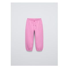 Pants with elastic waistband and front drawstring appliqué. Front pockets. Side printed text. Pink Drawstring Casual Joggers, Pink Casual Joggers With Drawstring, Spring Sweatpants With Drawstring, Pink Cotton Pants For Fall, Spring Bottoms With Comfort Waistband, Trendy Solid Pants With Elastic Cuffs, Trendy Bottoms With Elastic Cuffs For Spring, Spring Straight Joggers With Drawstring, Straight Joggers With Drawstring For Spring