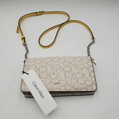 Calvin Klein Wallet On A String Purchase From Nordstrom Rack Box 42 Compact Beige Bags With Card Slots, Compact Beige Bag With Card Slots, Rectangular Wallet On Chain With Detachable Strap, Beige Evening Wallet Rectangular, Rectangular Beige Wallet On Chain, Rectangular Wallet On Chain With Card Slots As Gift, Beige Rectangular Evening Wallet, Beige Leather Wallet On Chain, Modern Beige Rectangular Wallet