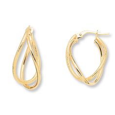 Interwoven teardrops loosely twist to form each of these exciting hoop earrings. The 14K yellow gold earrings secure with hinged backs. Elegant Yellow Gold Pear-shaped Hoop Earrings, Elegant Pear-shaped Yellow Gold Hoop Earrings, Formal Yellow Gold Pear-shaped Hoop Earrings, Teardrop Yellow Gold Hoop Earrings, Gold Pear-shaped Hoop Earrings For Anniversary, Elegant Yellow Gold Hoop Teardrop Earrings, Twisted Hoop Earrings, Gold Stock, Jewelry Education