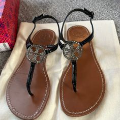 Tory Burch Women’s Violet Thong Black Patent Leather Sandal Size 9.5 Comes In Original Box With Dust Bag Retails Around 300 Rhynstone Tory Burch Logo Gently Worn Tory Burch Shoes, Black Patent Leather, Women's Shoes Sandals, Leather Sandals, Patent Leather, Tory Burch, Shoes Sandals, Original Box, Violet