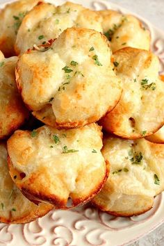 small biscuits with cheese and herbs on a plate