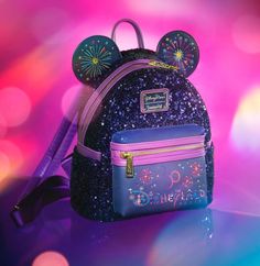 a backpack with ears and fireworks on it