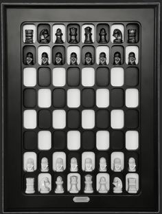 a black and white chess board with skulls on it