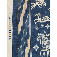 a blue and white rug with an animal design on the front, two different colors