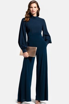 Elegance and sophistication are easily achieved in this easy-care jumpsuit. The wide-legs and blouson sleeve gives a flattering look that's comfortable as it is stylish. Fitted at the waist, so if between sizes size up. Machine washable. 95% Polyester, 5% Elastane. Jumpsuit Hijab, Breezy Outfit, Classy Jumpsuit, Formal Jumpsuit, Modesty Fashion, Jumpsuit Elegant, Jumpsuit With Sleeves