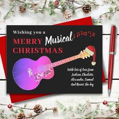 a christmas card with an acoustic guitar on it