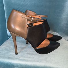 Coach Black + Olive Green Buttery Soft Leather Heels. Silver Colored Buckle Detail. Attractive Cut Out For A Show Of Skin. Size 9. Never Worn. Heels Silver, Black Olive, Coach Shoes, Leather Heels, Shoes Women Heels, Soft Leather, Olive Green, Shoes Heels, Cut Out