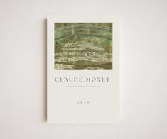 the front cover of a book with water lilies and a bridge in the background