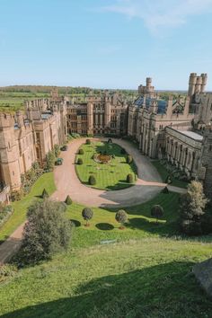 an aerial view of a large castle like building