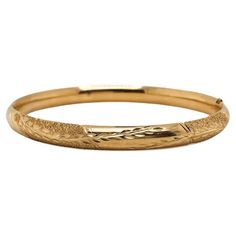 This slim bangle bracelet has a beautiful mix of finishes with wheat designs engraved across the domed surface. The bangle is 0.24-inch wide and 2 3/8-inch by 2 1/8-inch wide on the inside and will fit up to a 7-inch wrist. This was originally priced at $1,680! The details for this fabulous bracelet are listed below: Metal Quality: 14 karat (stamped) Complete Weight: 6.99 grams Inside measurements: 2.4 inches by 2.1 inches (60 x 54 mm) Width: 6 mm (0.24 inch) Thickness: 3 mm Clasp: Hidden Wheat Design, Star Jewelry, Five Star, Bangle Bracelet, Wheat, Metallica, Bangle Bracelets, Jewelry Bracelets, Bangles