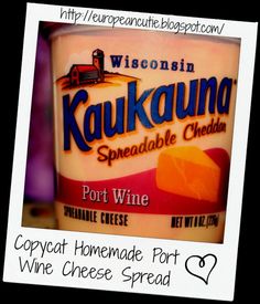 a close up of a cup of food on a table with the words kaukkauna spreadable chedda