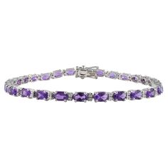 This Amethyst Tennis Bracelet with Diamonds in 14K gold showcases 28 endlessly sparkling natural amethyst, weighing 5.65 carat. It measures 7 inches long in length. Amethyst is a protective stone that helps to reduce stress and anxiety in your life. Designed with perfect oval cut amethyst with two diamonds in between after each amethyst to make you stand out on any occasion or event. The elegant style complements the attire beautifully and is a perfect graduation gift or wedding gift for anyone Bracelet Tennis, Tennis Bracelet Diamond, Oval Stone, Amethyst Stone, Diamond Sizes, Tennis Bracelet, Gemstone Bracelet, Oval Cut, Elegant Style