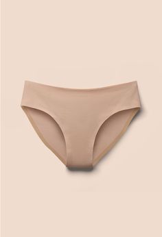 Bring on some serious comfort with this ultra-smooth, modest rise brief with full coverage on your peach. Seamless construction means the coverage you want with zero panty line to show for it. Our no-slip grip on the inside of the panty keeps it in place all day long. Ultra-soft fabric crafted for comfort Cotton lining for health and hygiene No riding, sliding, or bunching All sizes, XS - 4X Nude Panty, Comfortable Bras, Re A, S Signature, Fabric Shop, New Print, Tight Leggings, Fast Fashion, Briefs