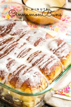 cinnamon bundt cake with icing in a glass dish