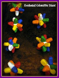 several colorful pinwheels are arranged on a baking sheet