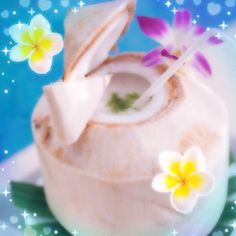 a close up of food on a plate with flowers and stars in the back ground