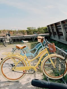 three bicycles are parked next to each other